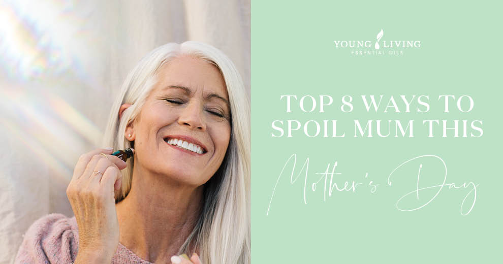 mom applying essential oil roll on featured image