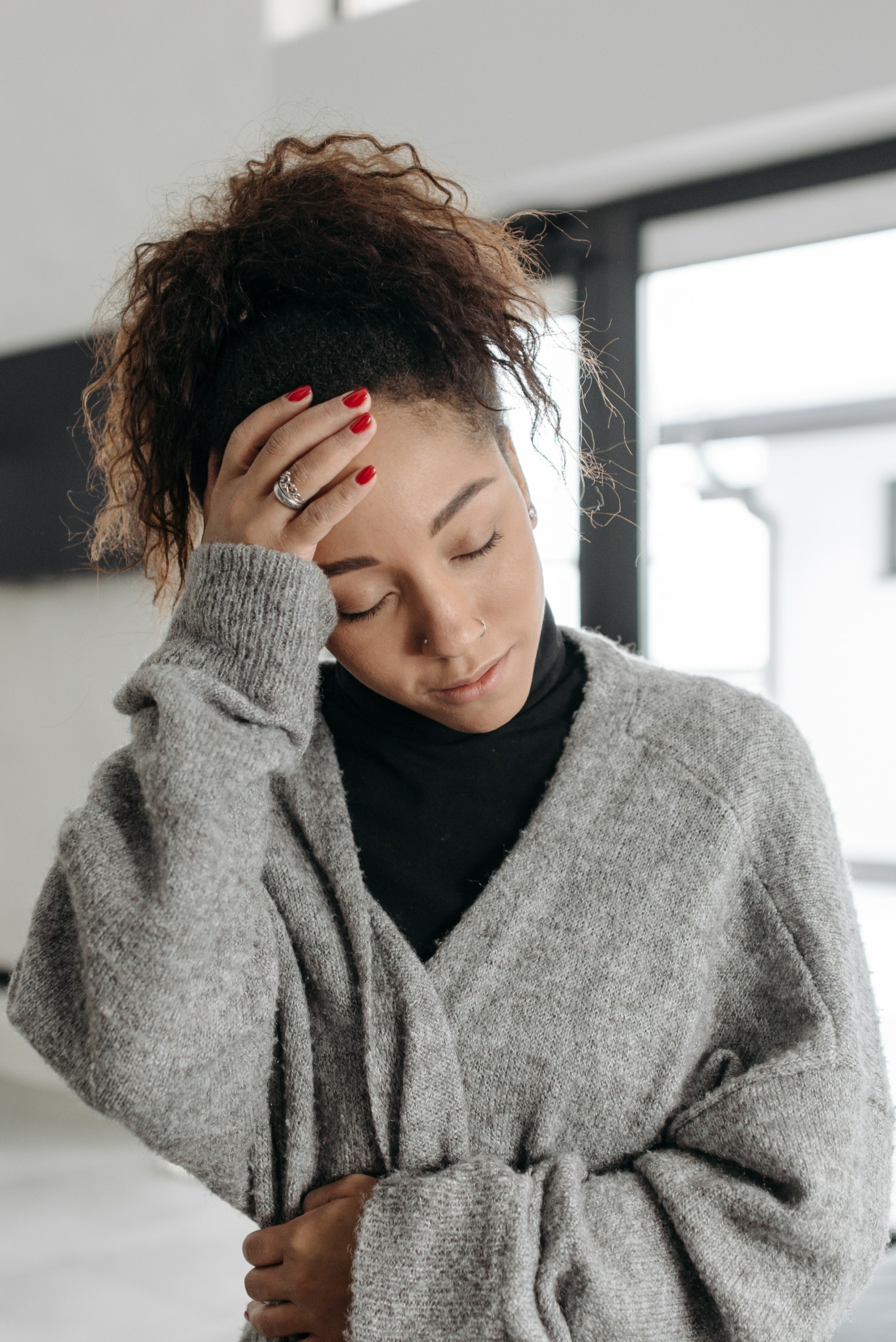 Woman looking ill - Young Living essential oils