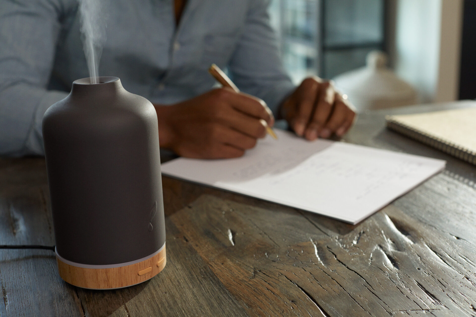 Man writing in notebook