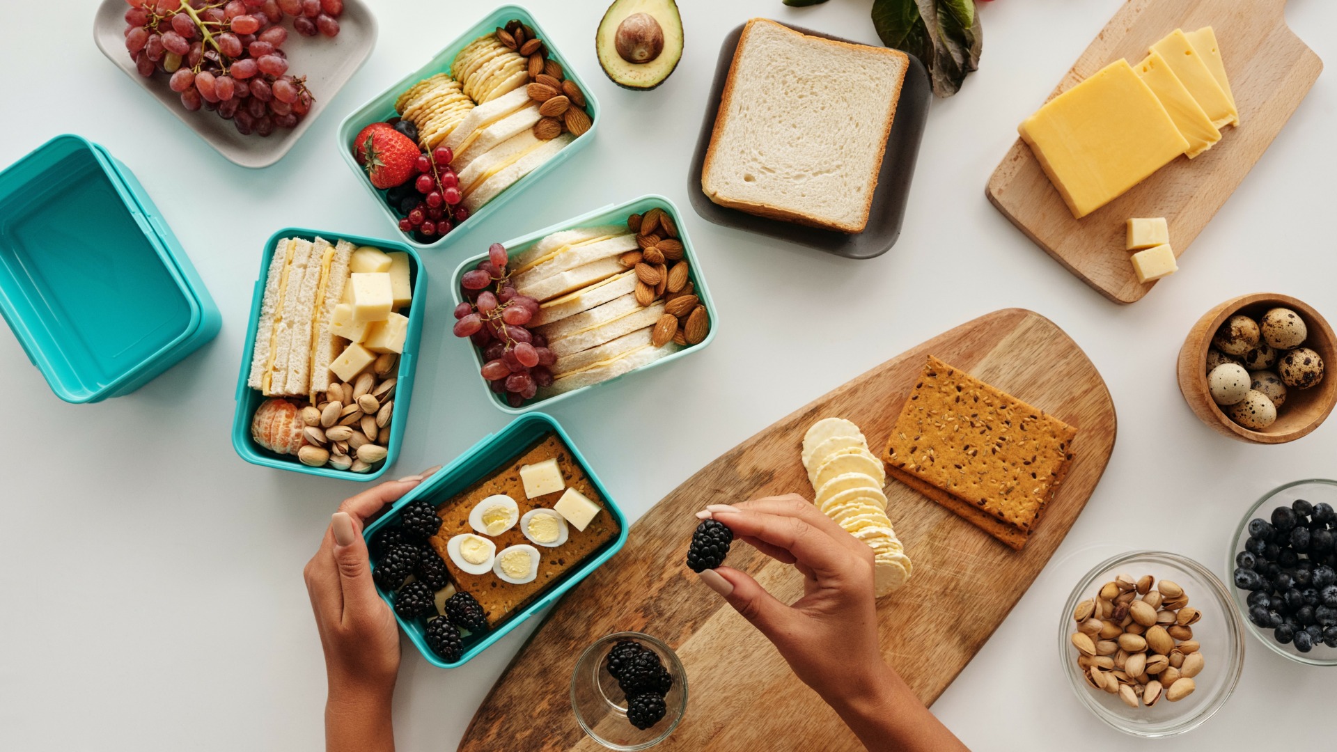 Woman packing snack boxes