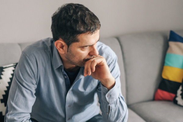 man showing signs of being stressed