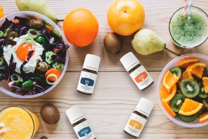 Orange+, Lemon+, Oregano+ and Basil+ essential oils with breakfast dishes