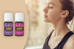 Forgiveness & Motivation essential oils with woman meditating