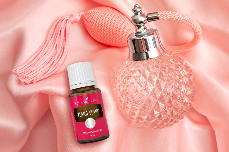 Ylang Ylang essential oil with perfume bottle