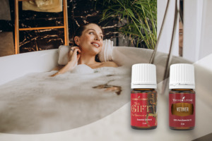 Ätherisches Öl The Gift und Vetivergras mit Frau in entspannendem Bad