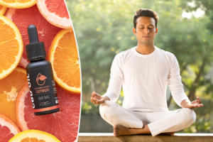 Meditierender Mann und Nature's Ultra Citrus CBD Öl auf frischen Orangen und Grapefruitscheiben