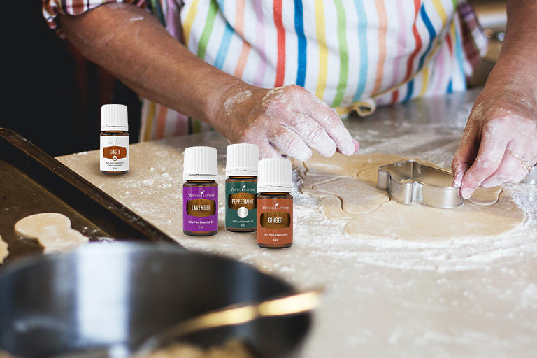 Fazer biscoitos na cozinha com os óleos essenciais de lavanda, hortelã-pimenta, gengibre e gengibre Plus