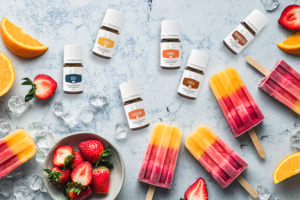 Frische Erdbeeren, Orangen und buntes Wassereis am Stiel mit Young Livings ätherischen Ölen der Pluslinie Basil+, Cinnamon Bark+, Tangerine+, Orange+, Lemon+, Ginger+