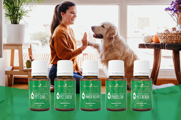 Um cão com o seu dono a desfrutar da gama Animal Scents® da Young Living