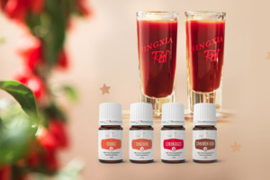 NingXia Red® Getränk in Shot-Gläsern mit ätherischem Zimtrindenöl, Mandarinenöl, Orangenöl und Zitronengrasöl der Pluslinie von Young Living Cinnamon Bark+, Tangerine+, Orange+ und Lemongrass+