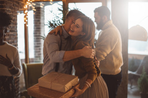 Image of friends celebrating at a Christmas party.