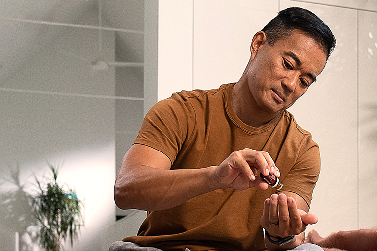 Image of man enjoying essential oils.