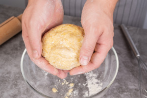 Image of shortbread cookie dough being mixed in a bowl.