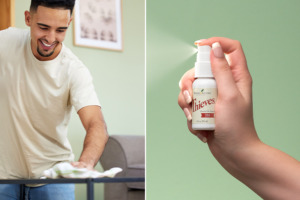 Image of man cleaning coffee table with Thieves® Spray.