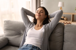 Image of woman relaxing on the sofa.