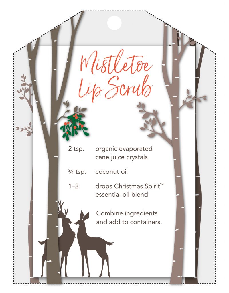 Mistletoe lip scrub printable gift tag showing some deer under mistletoe. Recipe says: Mistletoe lip scrub: 2 tsp organic evaporated cane juice crystals, 3/4 tsp coconut oil, 1 to 2 drops christmas spirit essential oil blend. Combine ingredients and add to containers. 