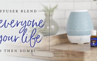 A diffuser and two essential oil bottles in a kitchen with the text A diffuser blend for everyone in your life (and then some)