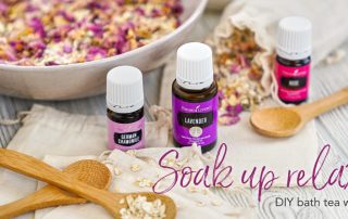 bowls of diy bath tea with essential oils, epsom salt, and flower petals