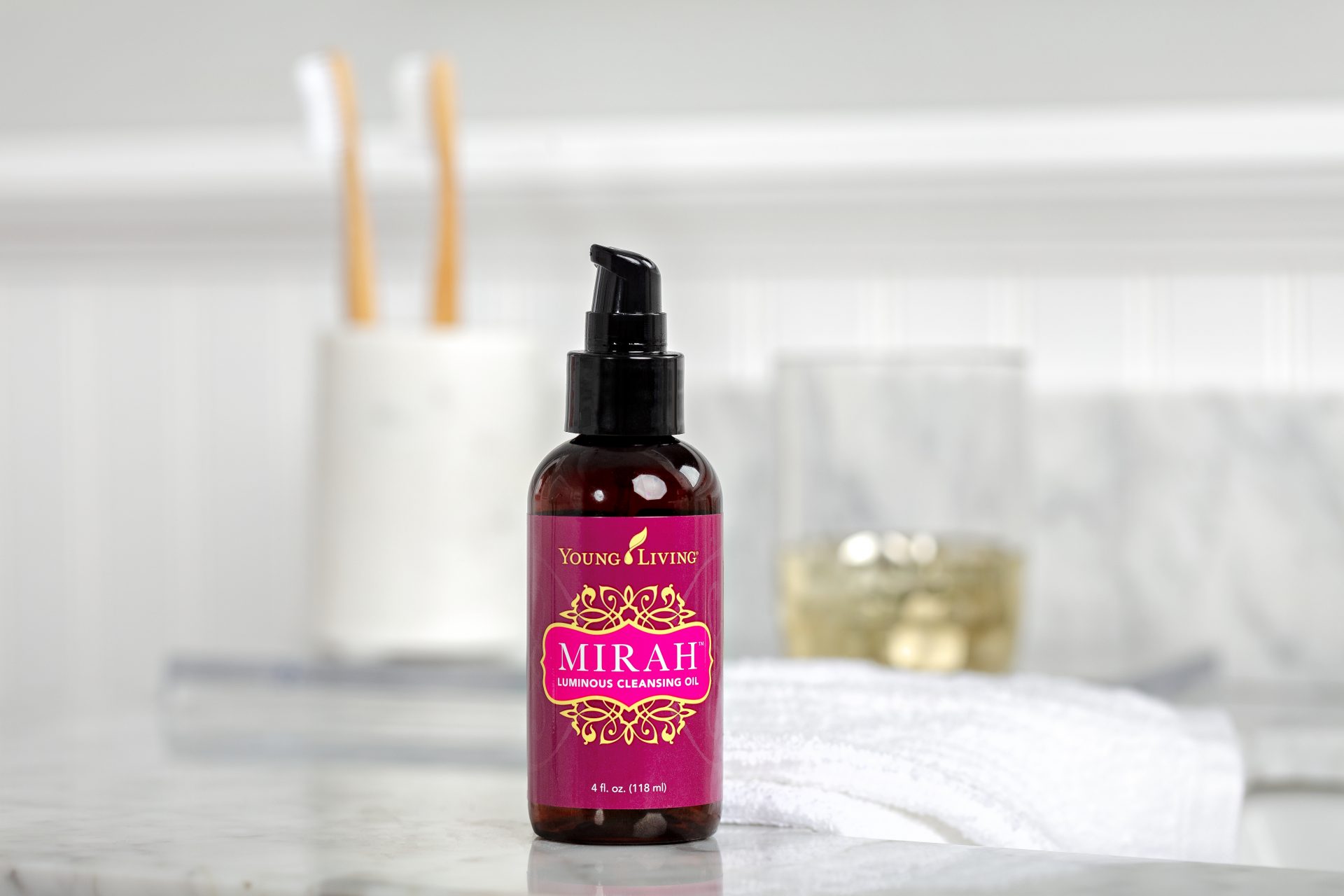 Mirah hair oil on a granite bathroom countertop