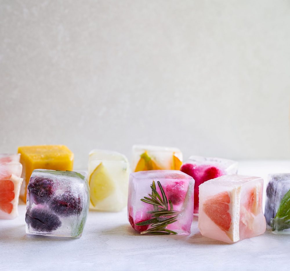 DIY essential oil ice cubes with botanicals and fruit