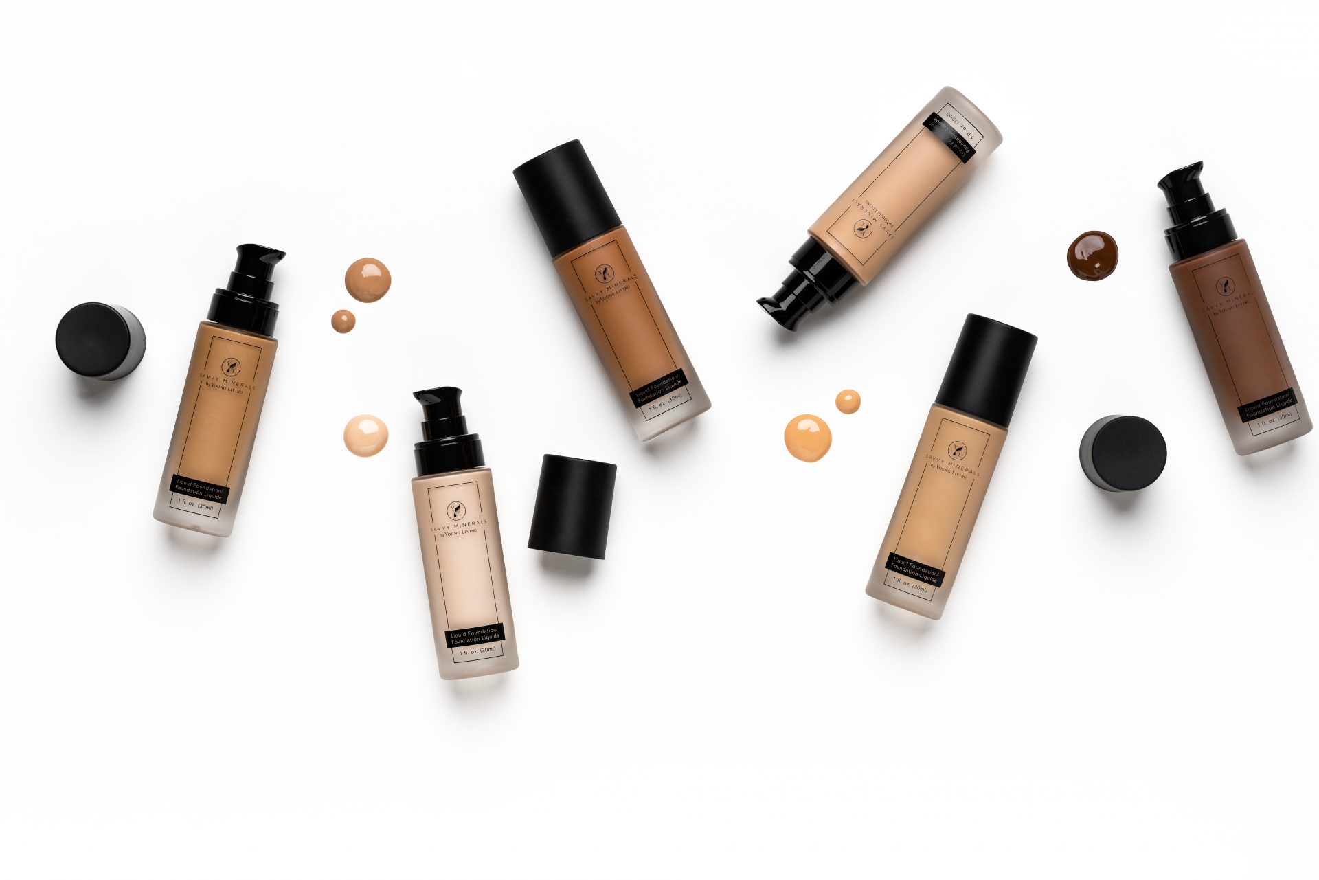 savvy minerals: the NEW standard in clean beauty liquid foundation in different shades on a white background