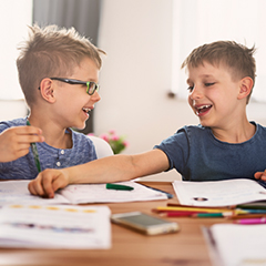 Children doing homework on the table