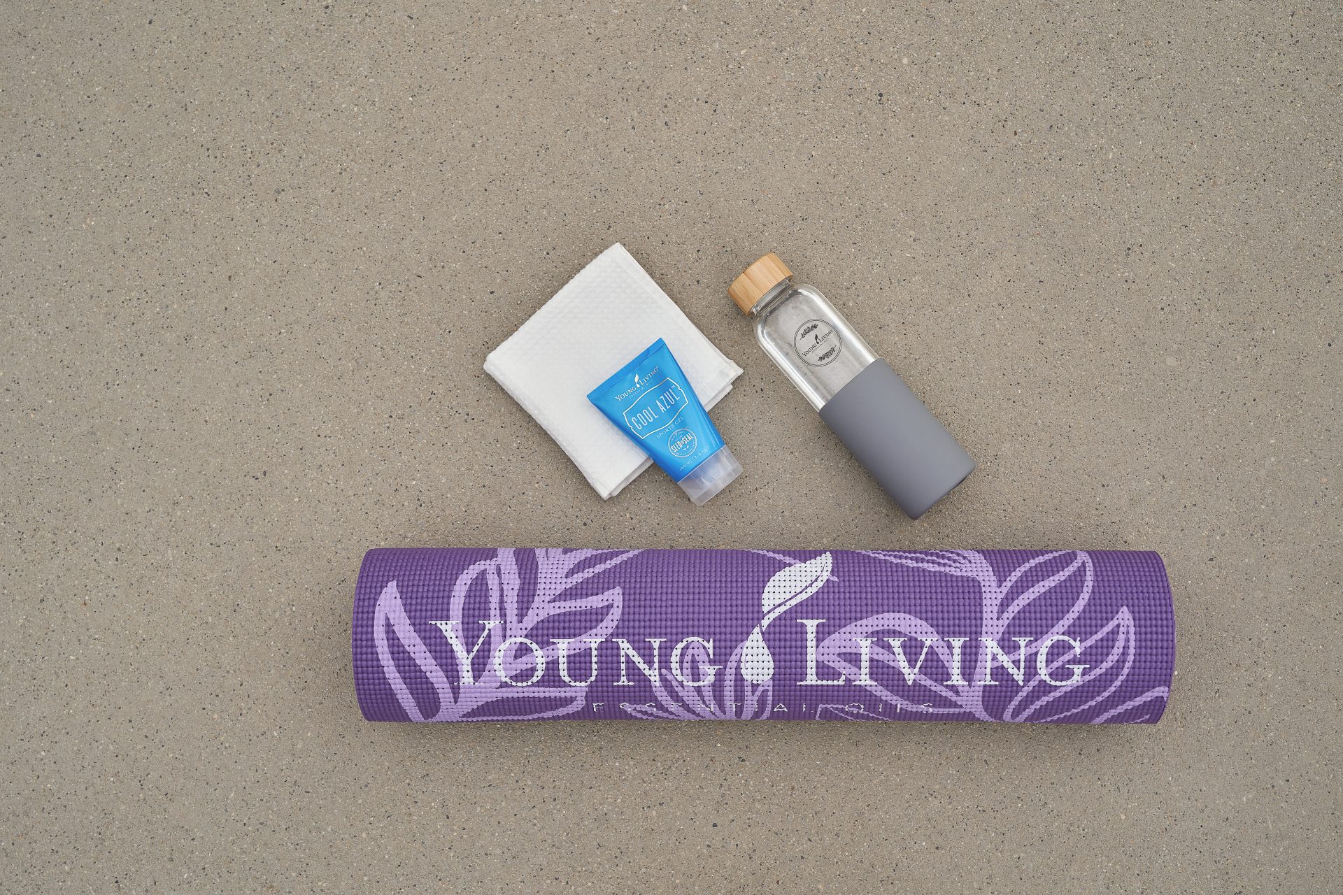 Yoga mat, bottles, and cooling cream