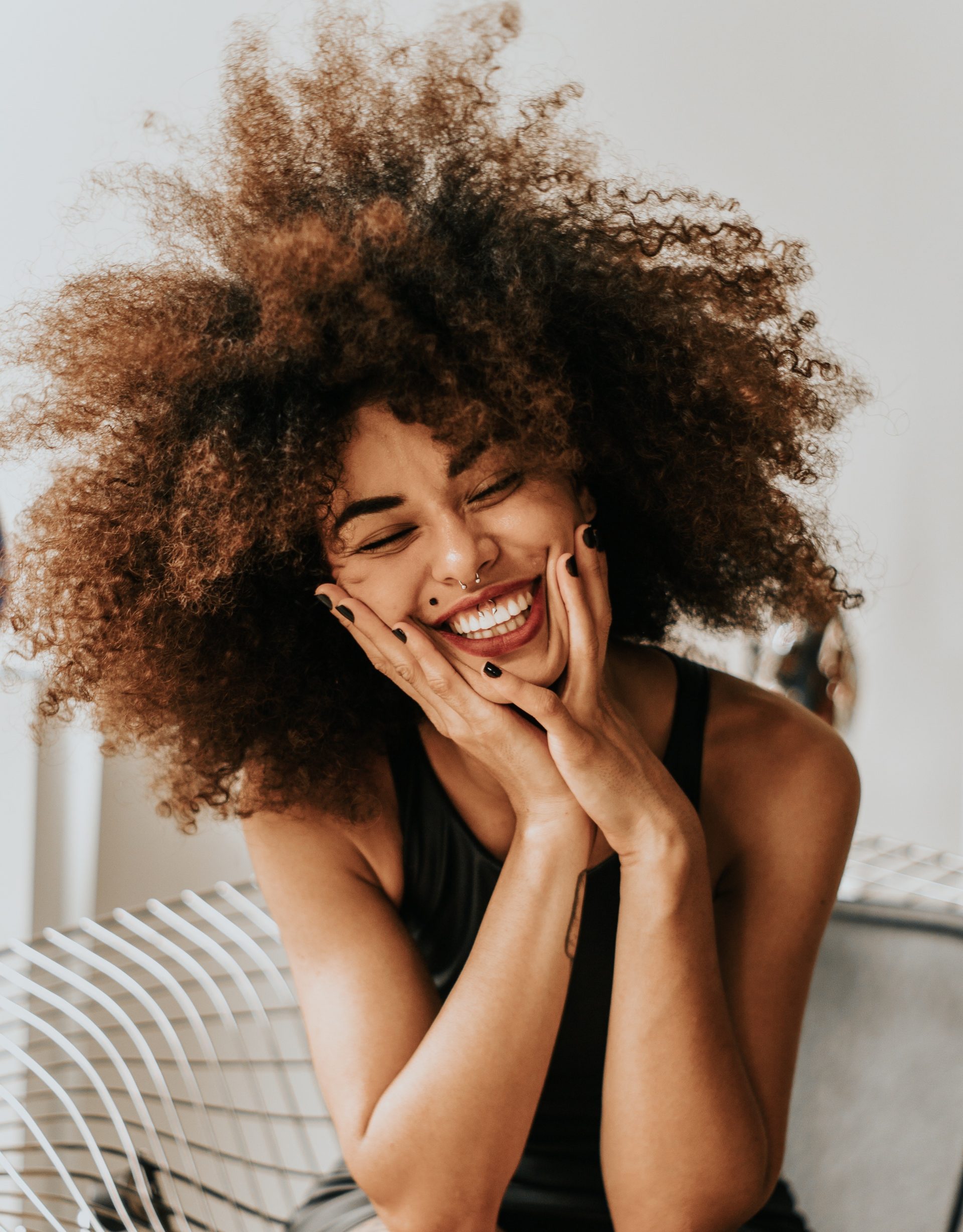 Woman smiling - Photo by Guilherme Almeida from Pexels - Young Living Lavender Life Blog