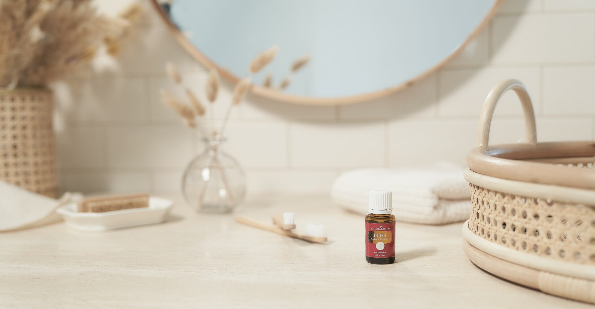 Tea Tree Essential Oil on bathroom counter top - Young Living Essential Oils