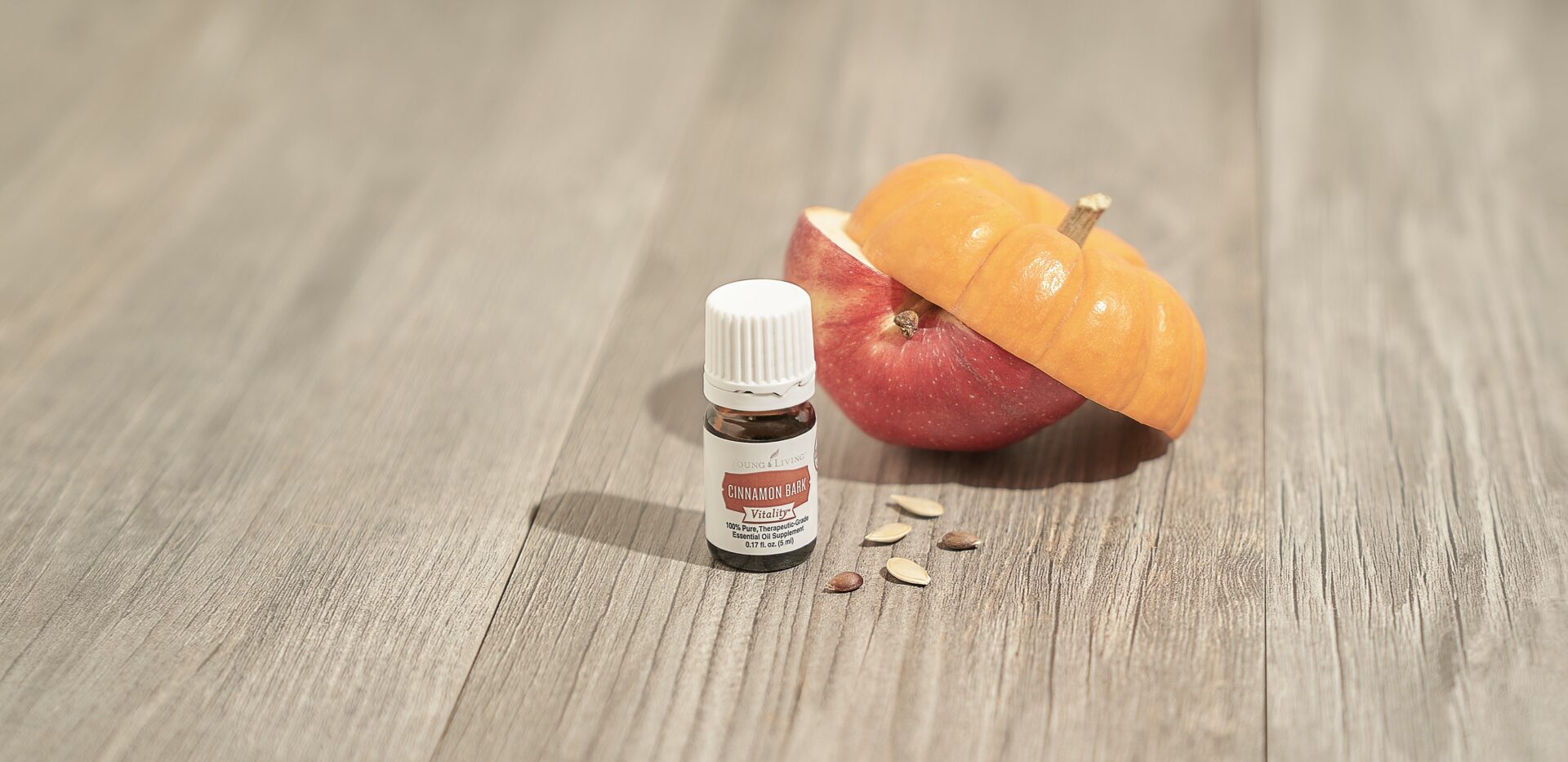 Sliced pumpkin and apple with Cinnamon Bark Vitality Essential Oil - Young Living Lavender Life Blog 