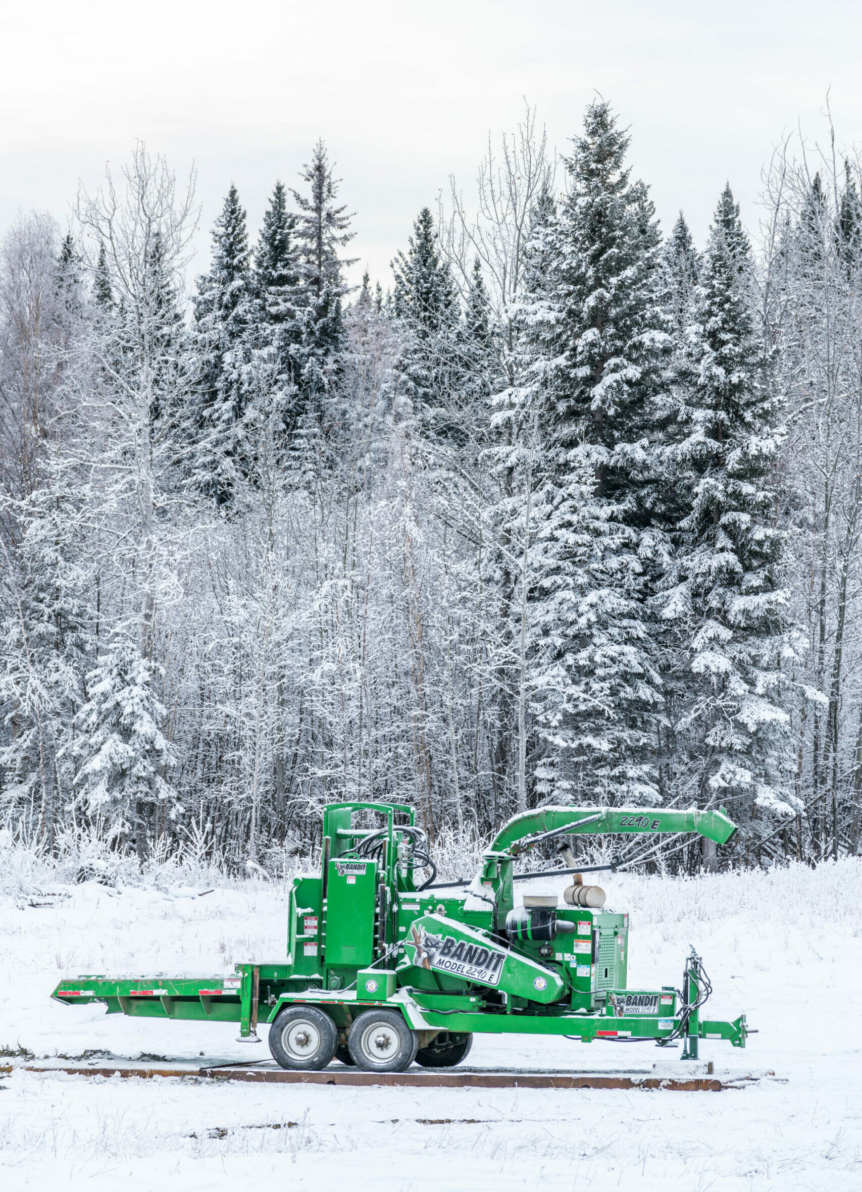 NorthernLights_053 Green machine sitting in the snow at the Northern Light's Farm - Young Living Lavender Life Blog