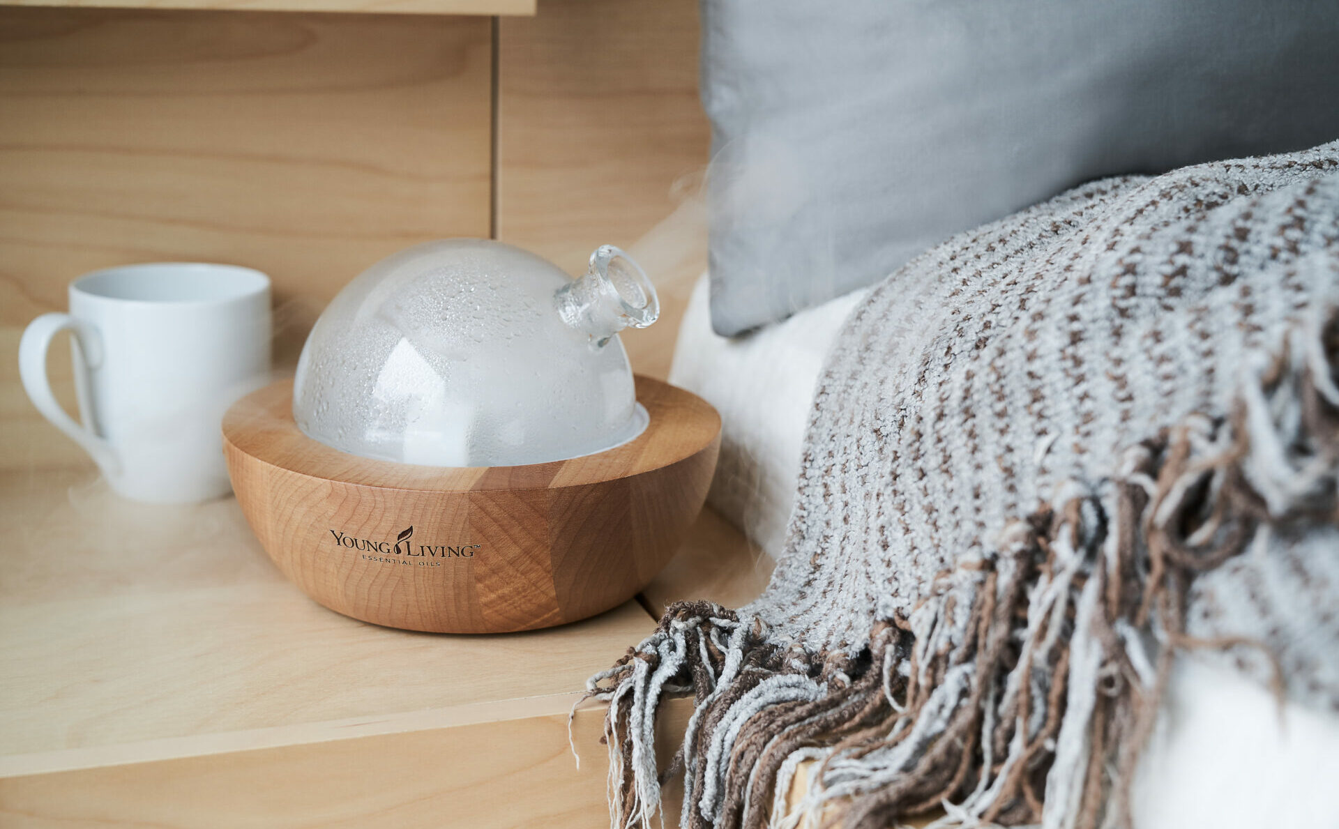Aria diffuser on bedside table - Young Living Lavender Life blog 