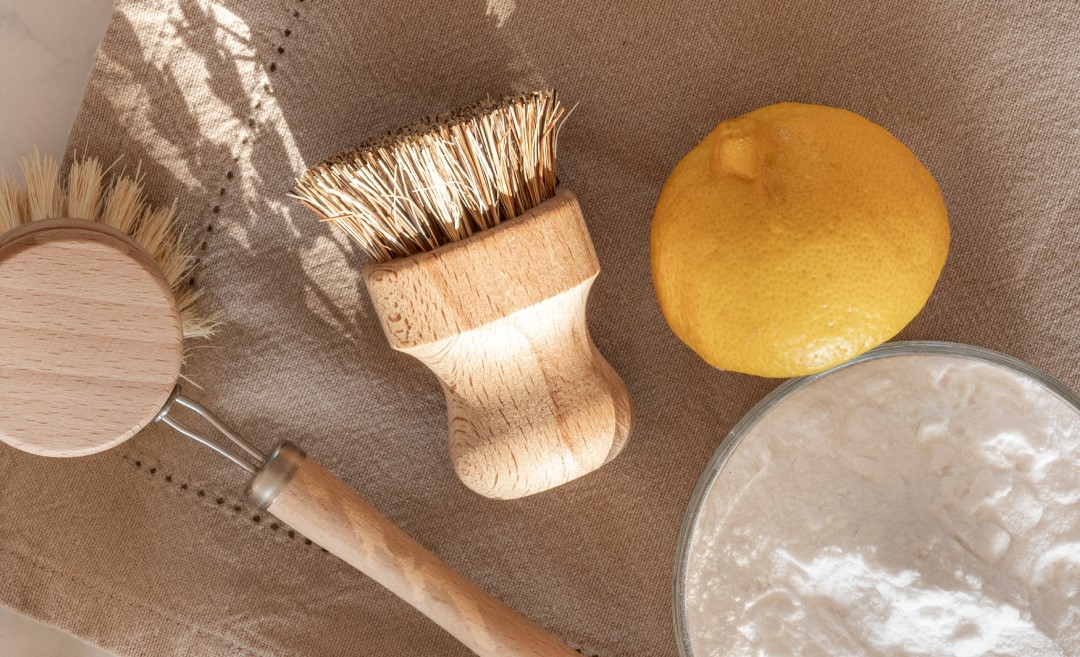 Thieves-Cleaning-Fizzies-for-April-Promo-April-2021-Instagram-Story_US (2) Scrub brush, lemon, and baking soda sitting on cloth - Young Living Lavender Life Blog