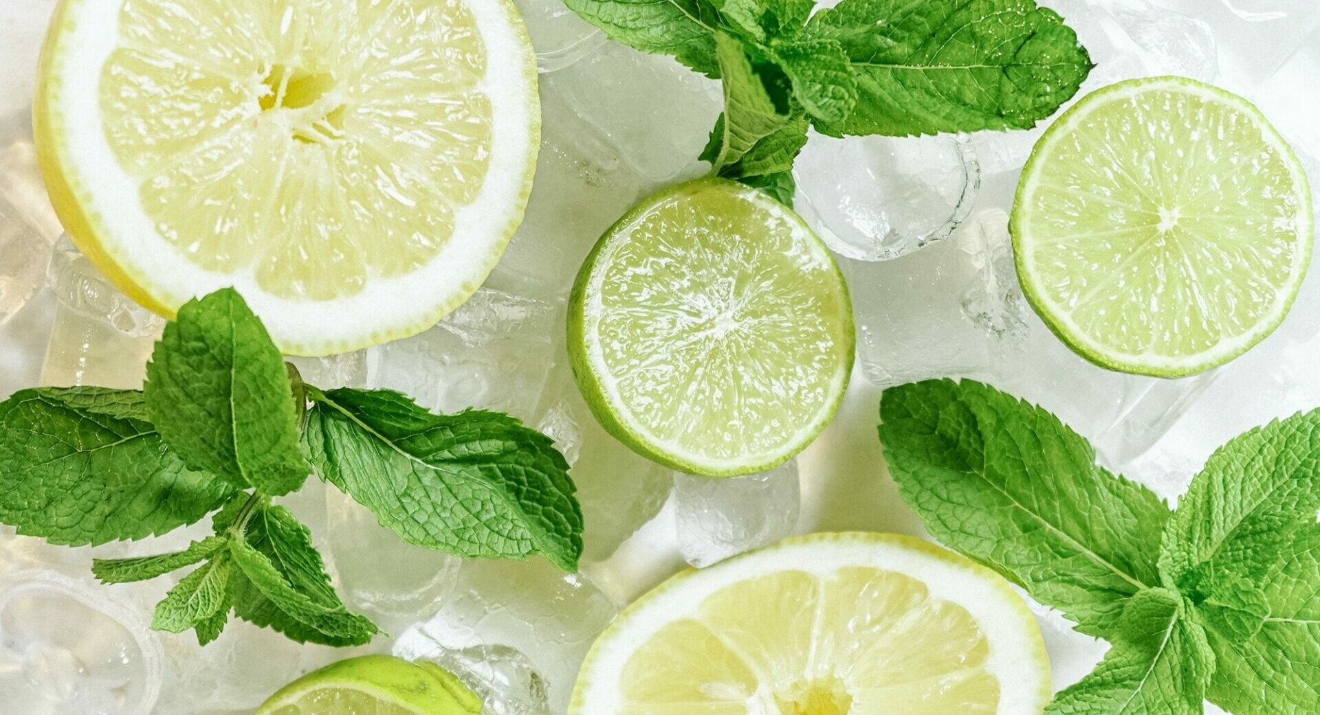 pexels-farhad-hossain-7358946 Lemon and lime slices with fresh mint and ice - Young Living Lavender Life blog