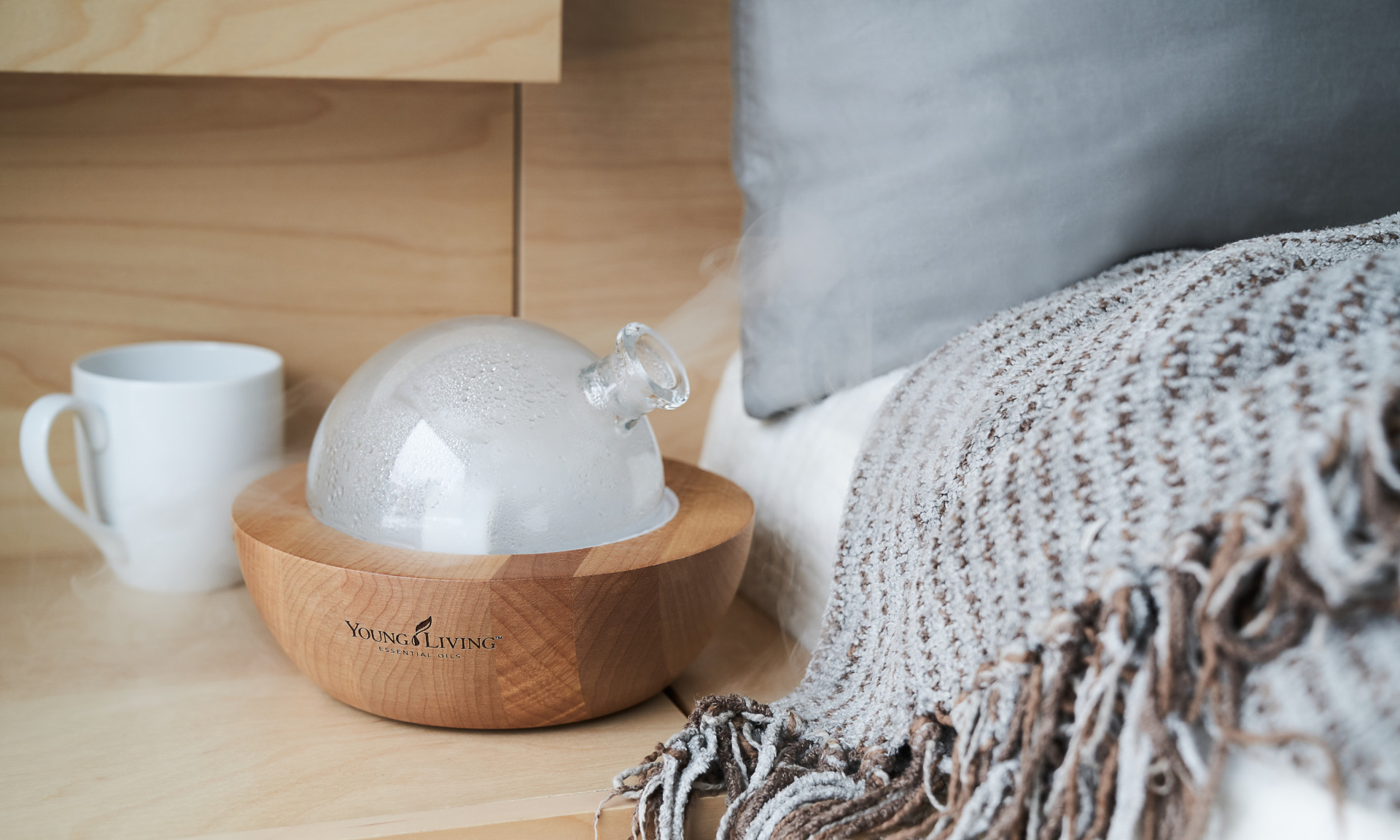 Aria diffuser on bedside table - Young Living Lavender Life blog 
