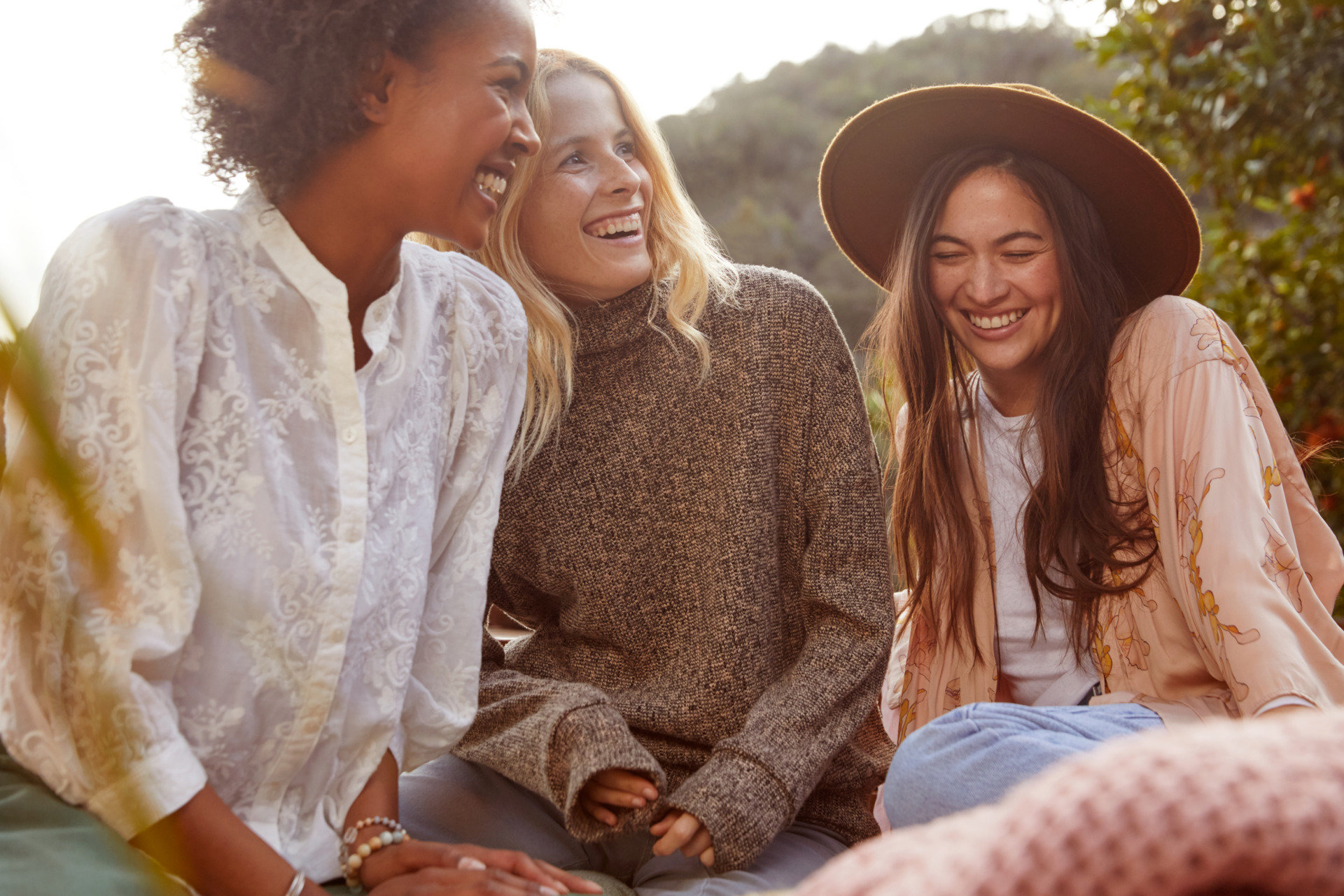 Group of friends laughing together - Young Living Lavender Life Blog