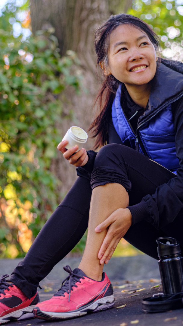 woman using cbd cream