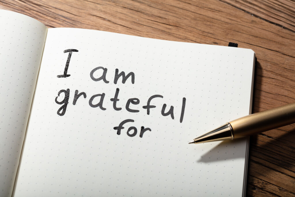 bigstock-Close-up-Of-Gratitude-Word-Wit-265169737
